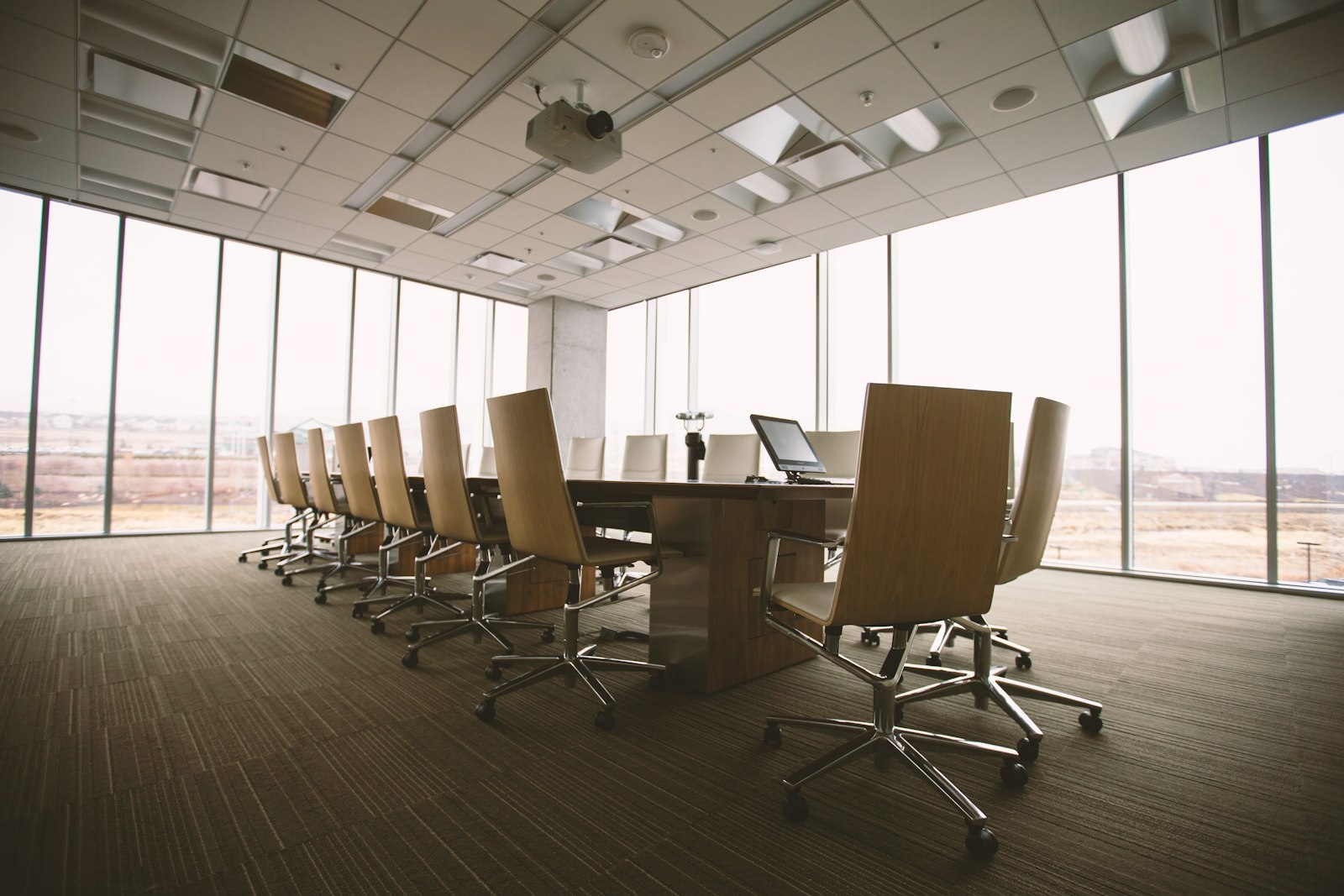 Boardroom with a long table and panoramic windows